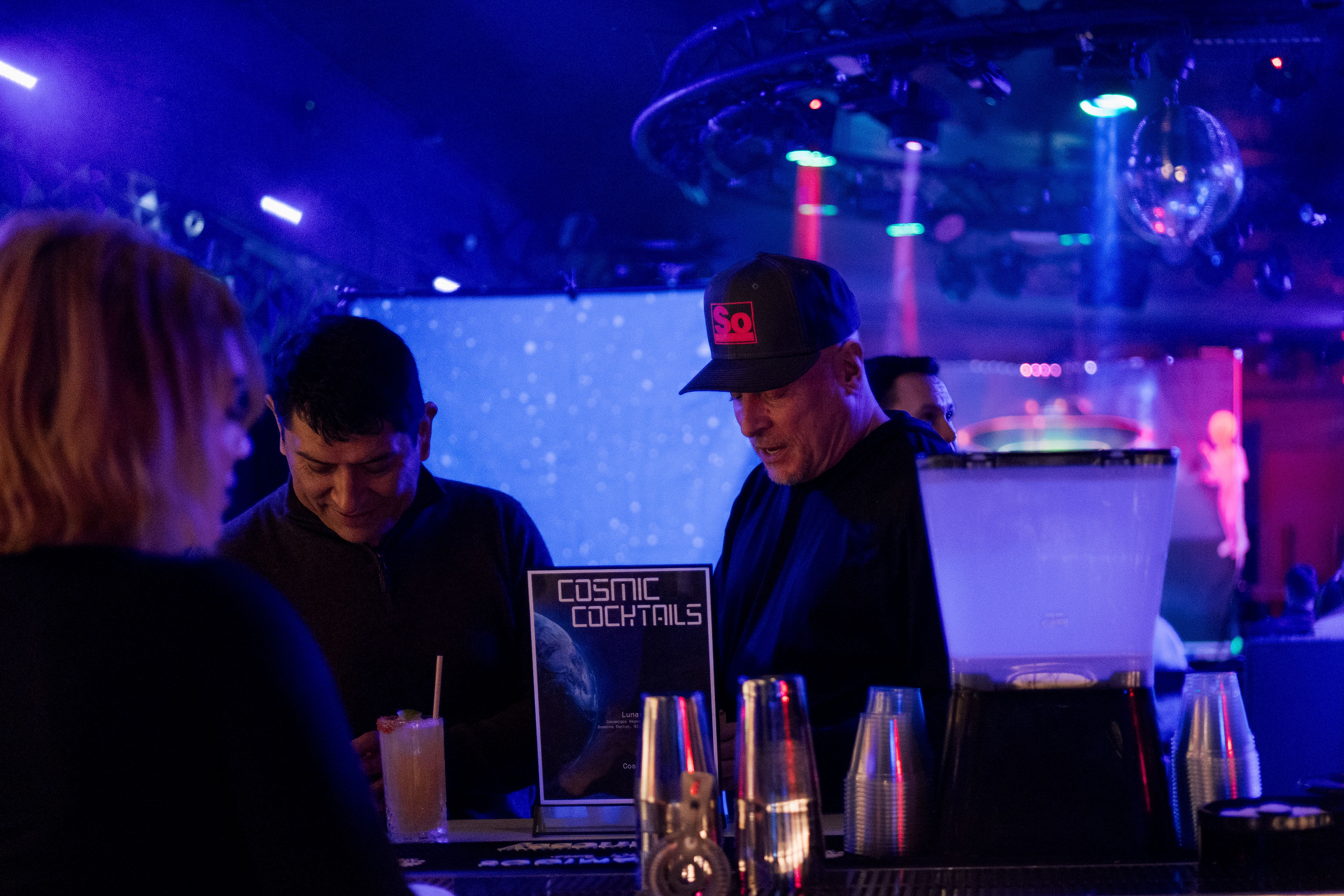 Comic performing on stage at The Valencia Room